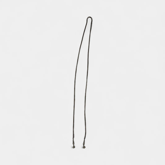 Thin metal rope chain with bead on the ende , can be worn as belt or a necklace