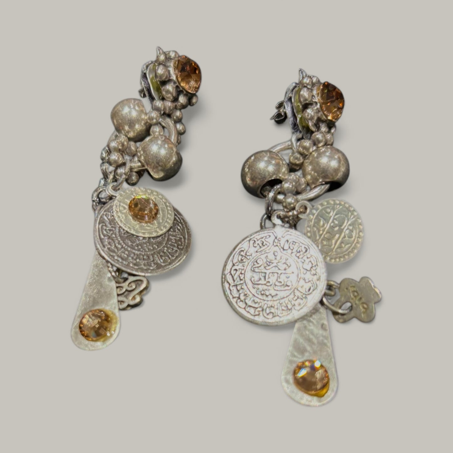 beautiful dangling piearces earrings with metail beads, selected charms and rhinestones