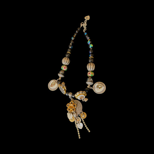 Necklace made with various shaped  stones and charms