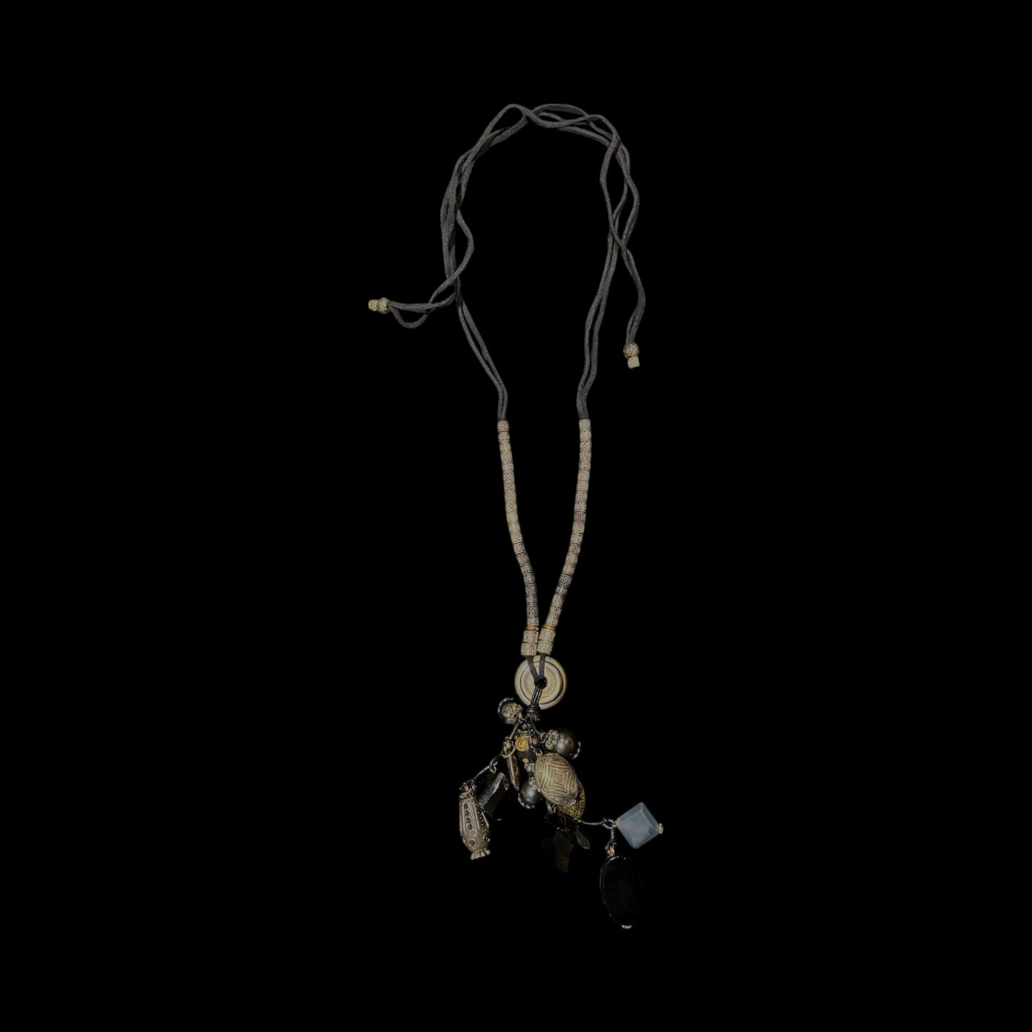 Beaded  string necklace featuring collection of unique stones