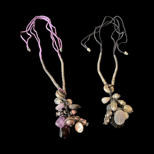 Beaded  string necklace featuring collection of unique stones