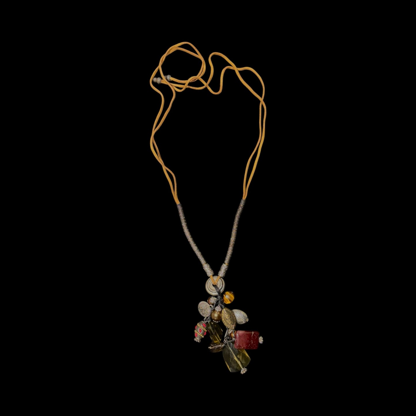 Beaded  string necklace featuring collection of unique stones
