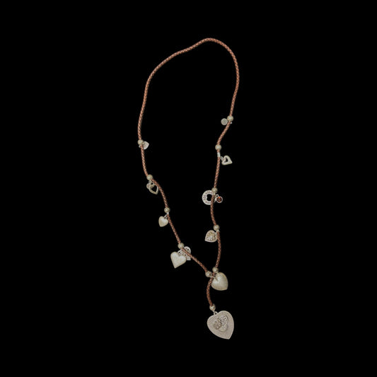 Brown rope leather necklace featuring a selection of heart- shaped charms
