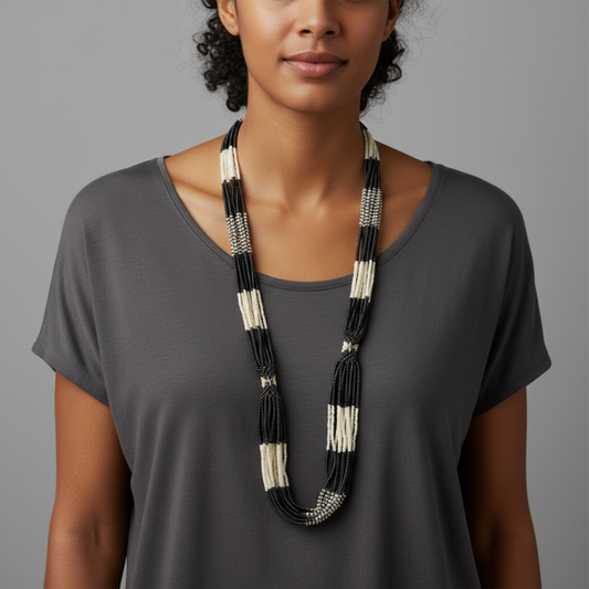 String of black and white beaded necklace