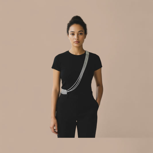 Chain accessory can be worn cross body or as a layered necklace
