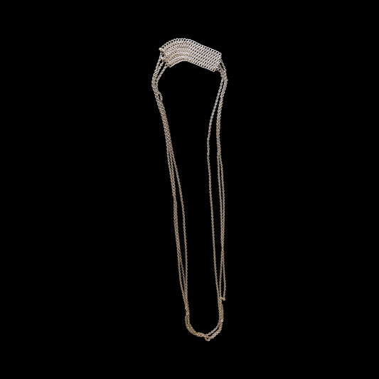 Chain accessory can be worn cross body or as a layered necklace