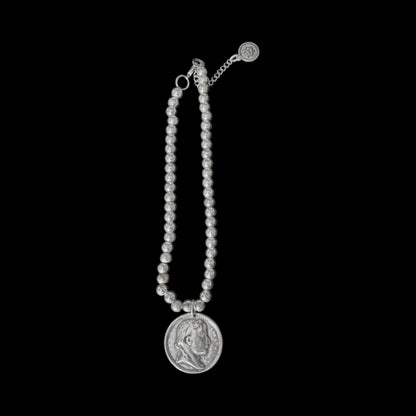 Silver metal beaded pendent with an elegant coin charm - can also be worn as a bracelet