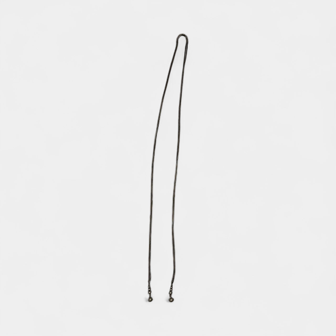 Thin metal rope chain with bead on the ende , can be worn as belt or a necklace