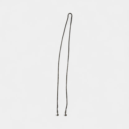 Thin metal rope chain with bead on the ende , can be worn as belt or a necklace