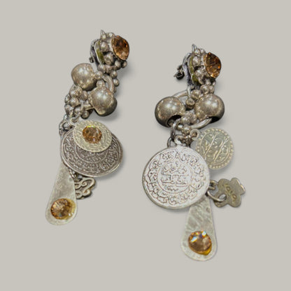 beautiful dangling piearces earrings with metail beads, selected charms and rhinestones