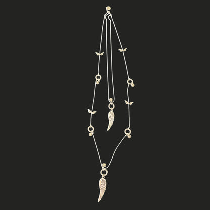 Long Layered silver necklace enchanced with shiny stones