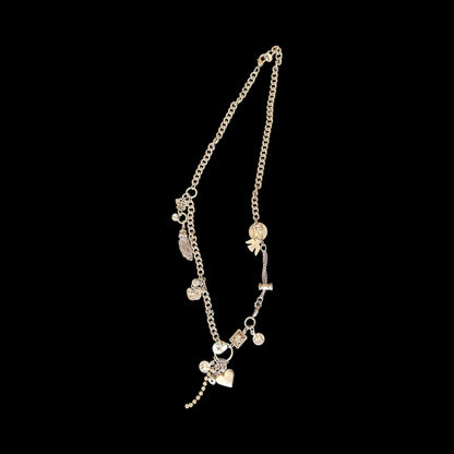 Sliver chain necklace featuering  unique assorted charms