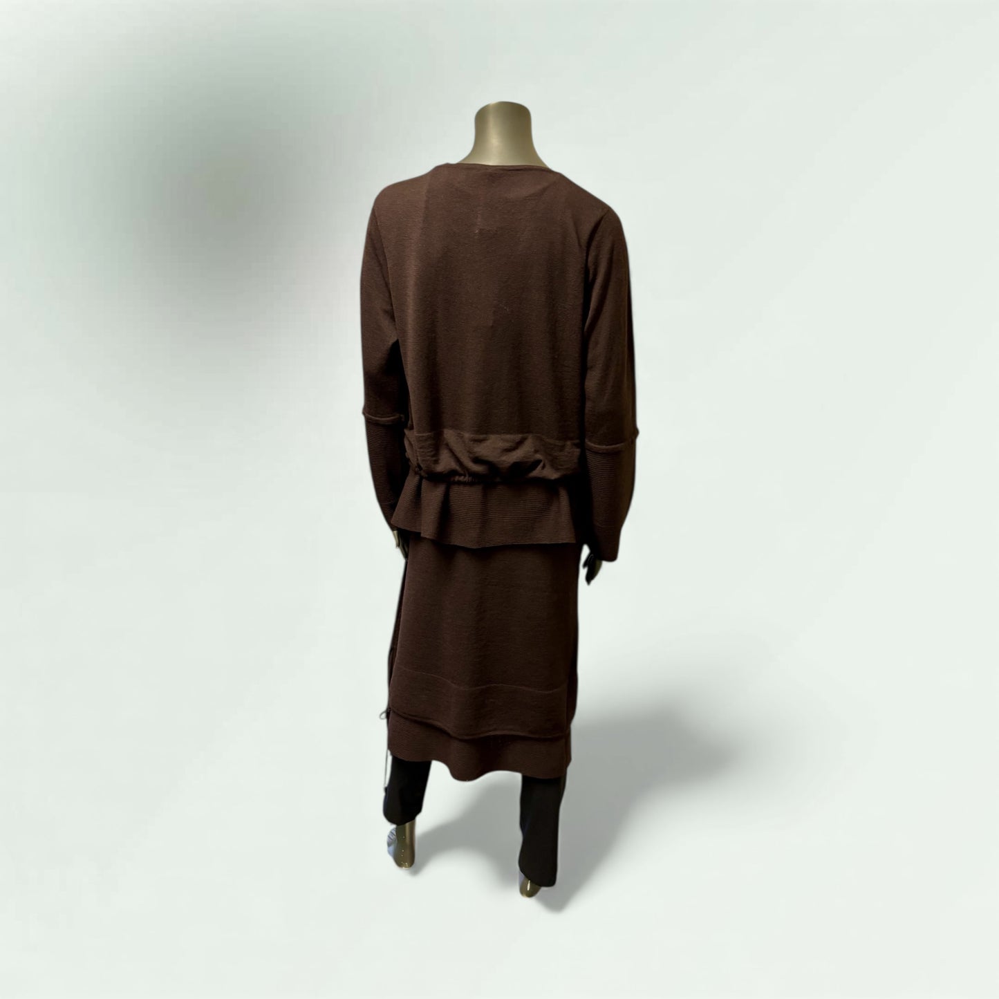 Team the Skirt with Layered Sweater