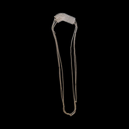 Chain accessory can be worn cross body or as a layered necklace